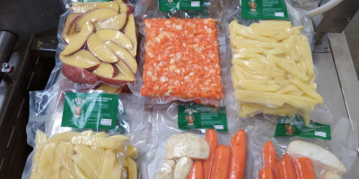 Peeled carrots, dragged in different shapes and vacuumed