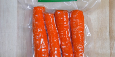 Peeled carrots, dragged in different shapes and vacuumed
